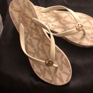 Off white flip flops w/small wedge heel